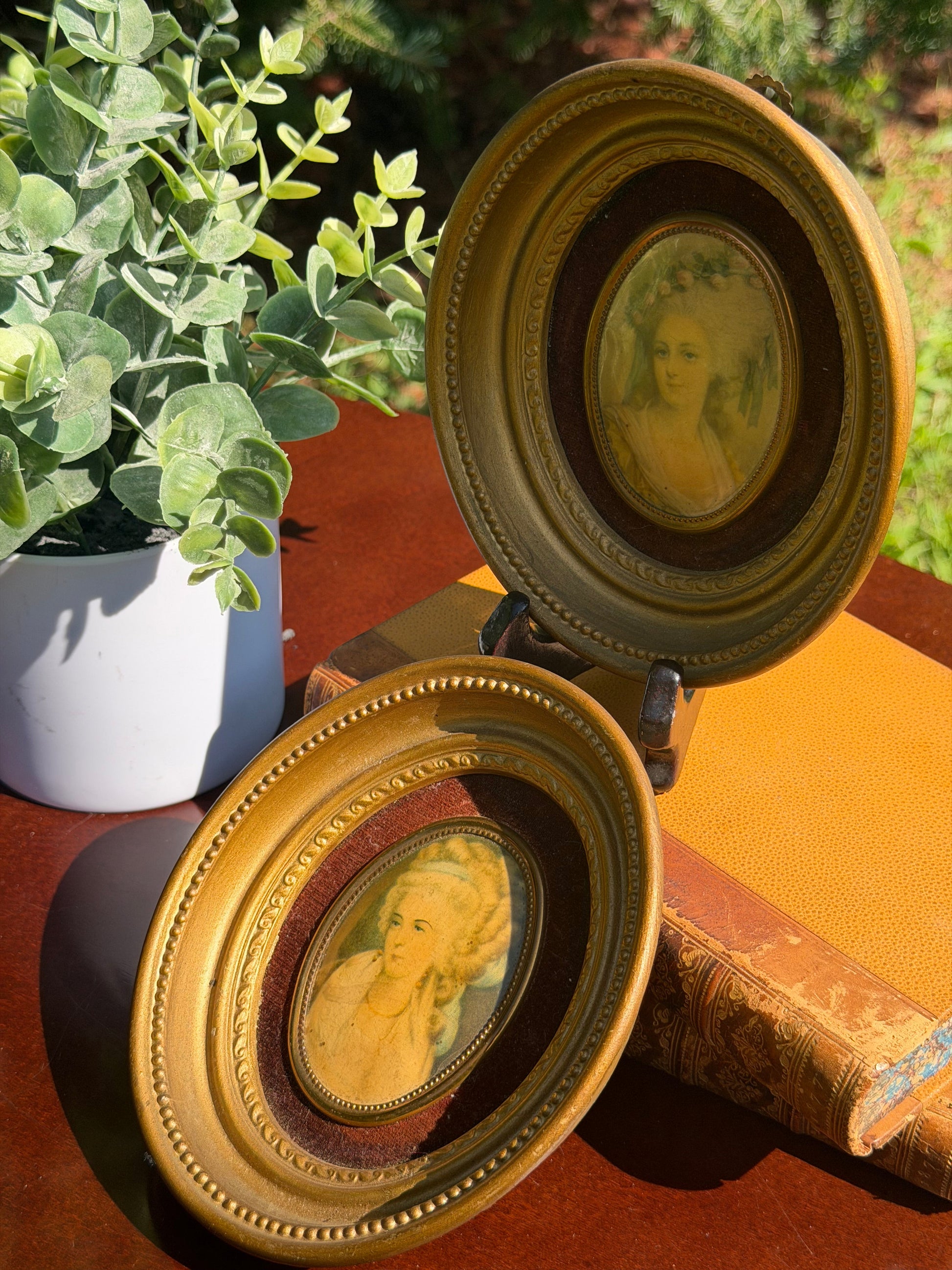 Reverse of both Cameo Creation frames showing maker labels, Princess Lamballe and Mrs. Chaplin