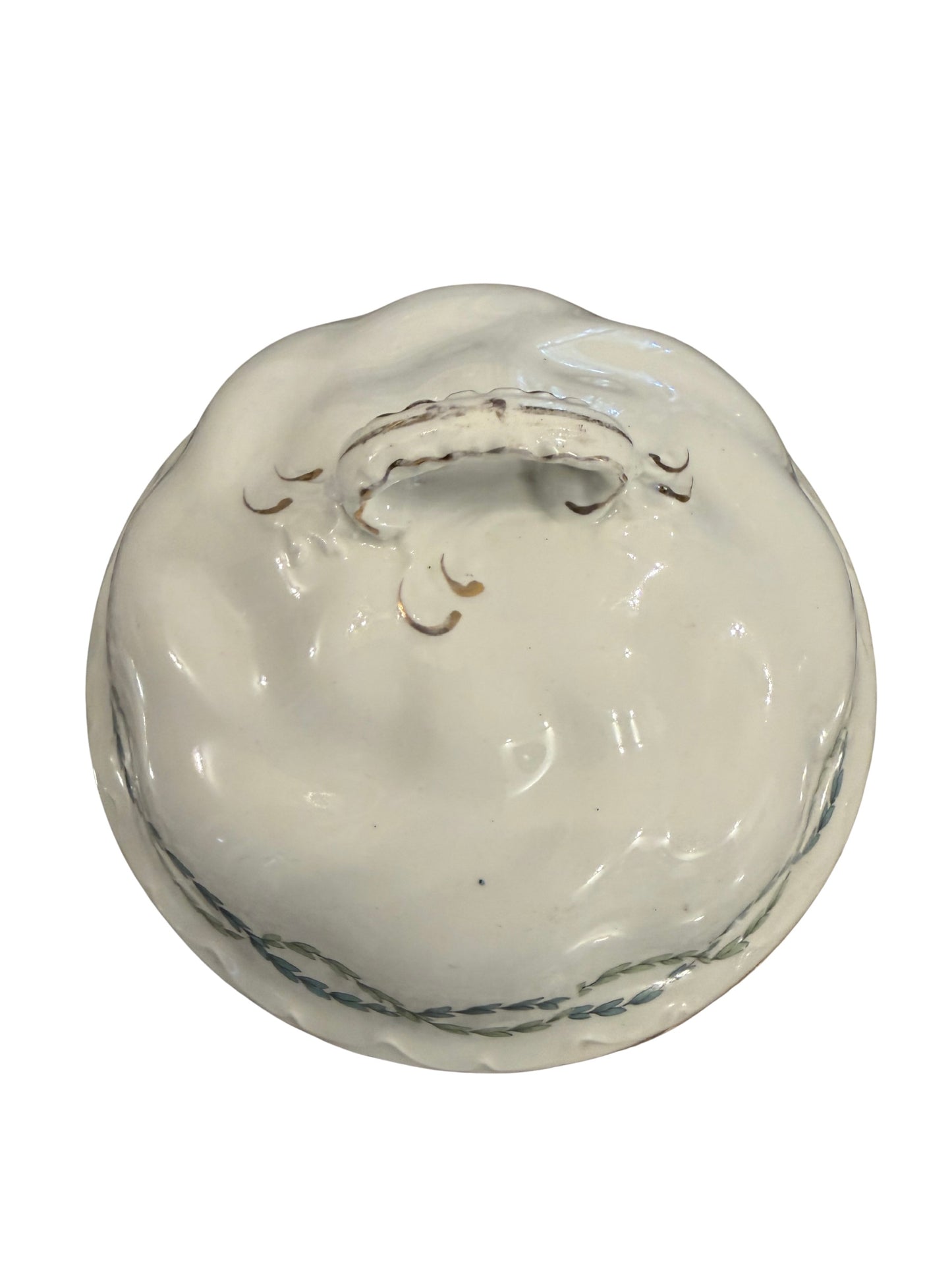 Antique white porcelain dome lid with rope-twist band, scalloped edge, and arched scroll handle